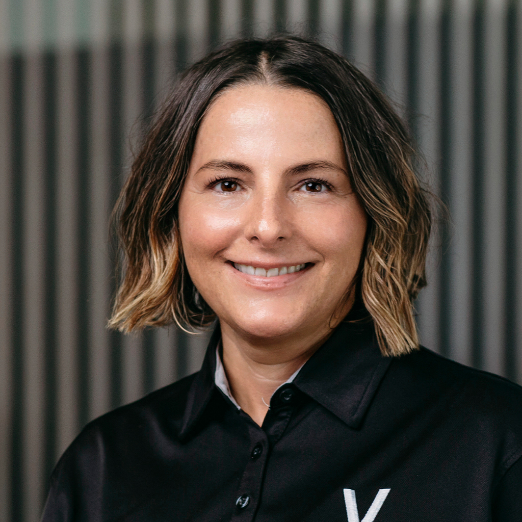 Smiling woman in black shirt portrait